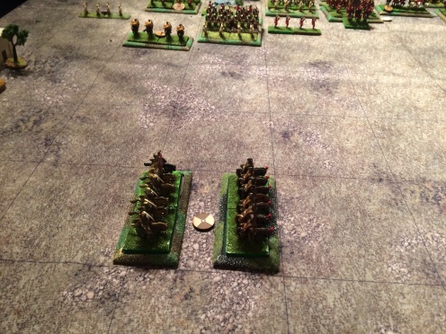 The Left Flank cavalry see a threat forming in the centre, turn to face and then spend the rest of the game failing to move at all towards it.